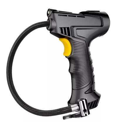 Portable air compressor inflating a car tyre